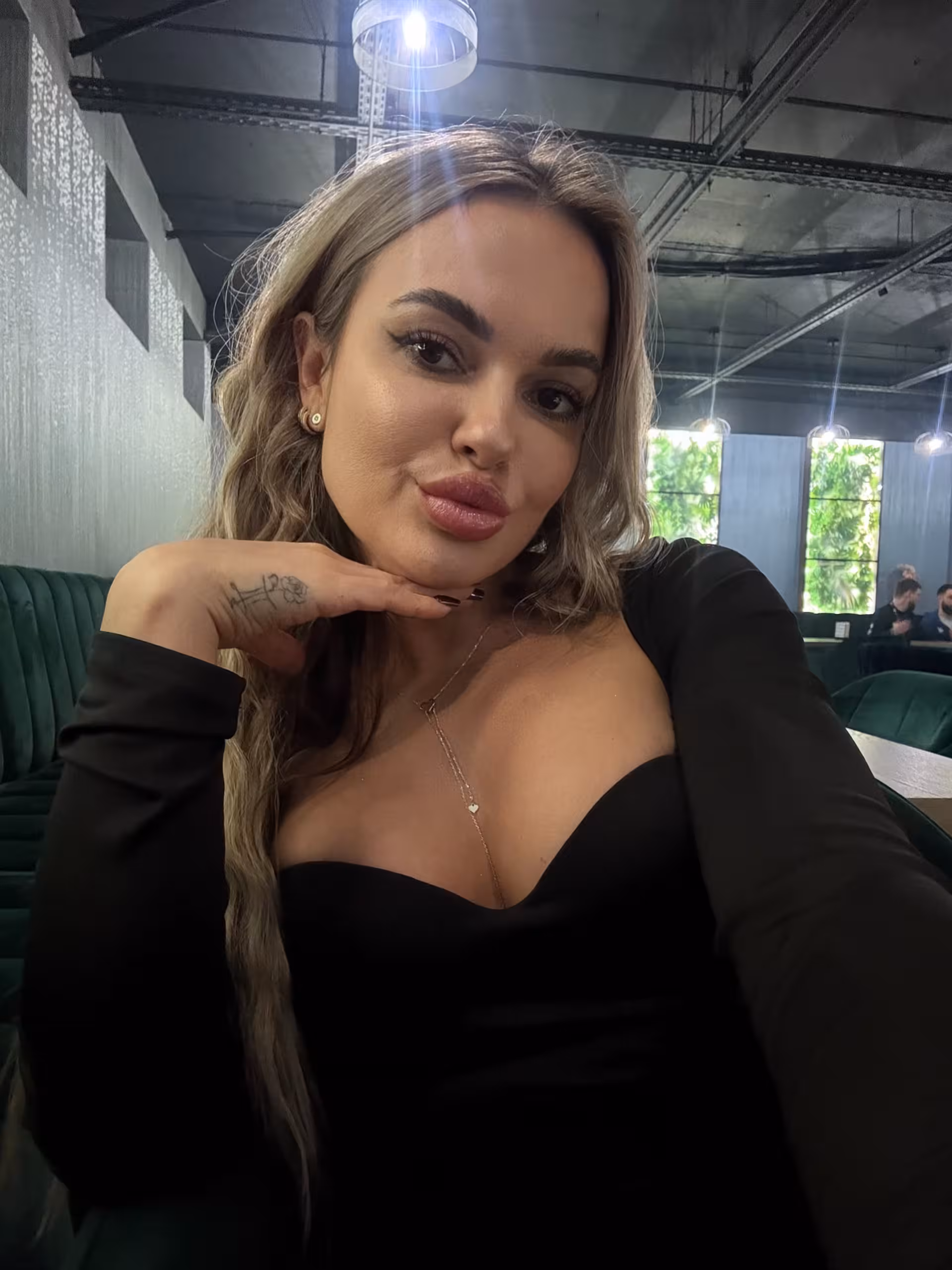 Open Woman's Profile