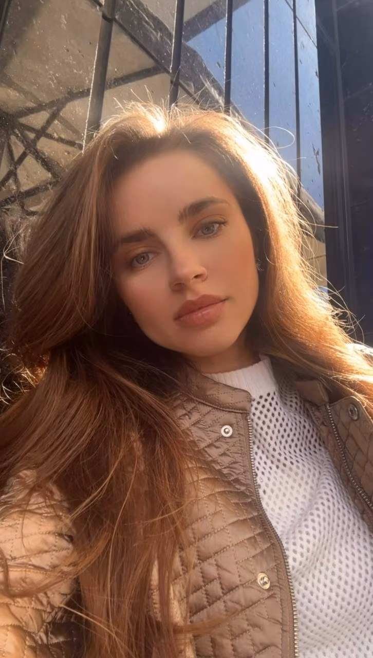 Open Woman's Profile