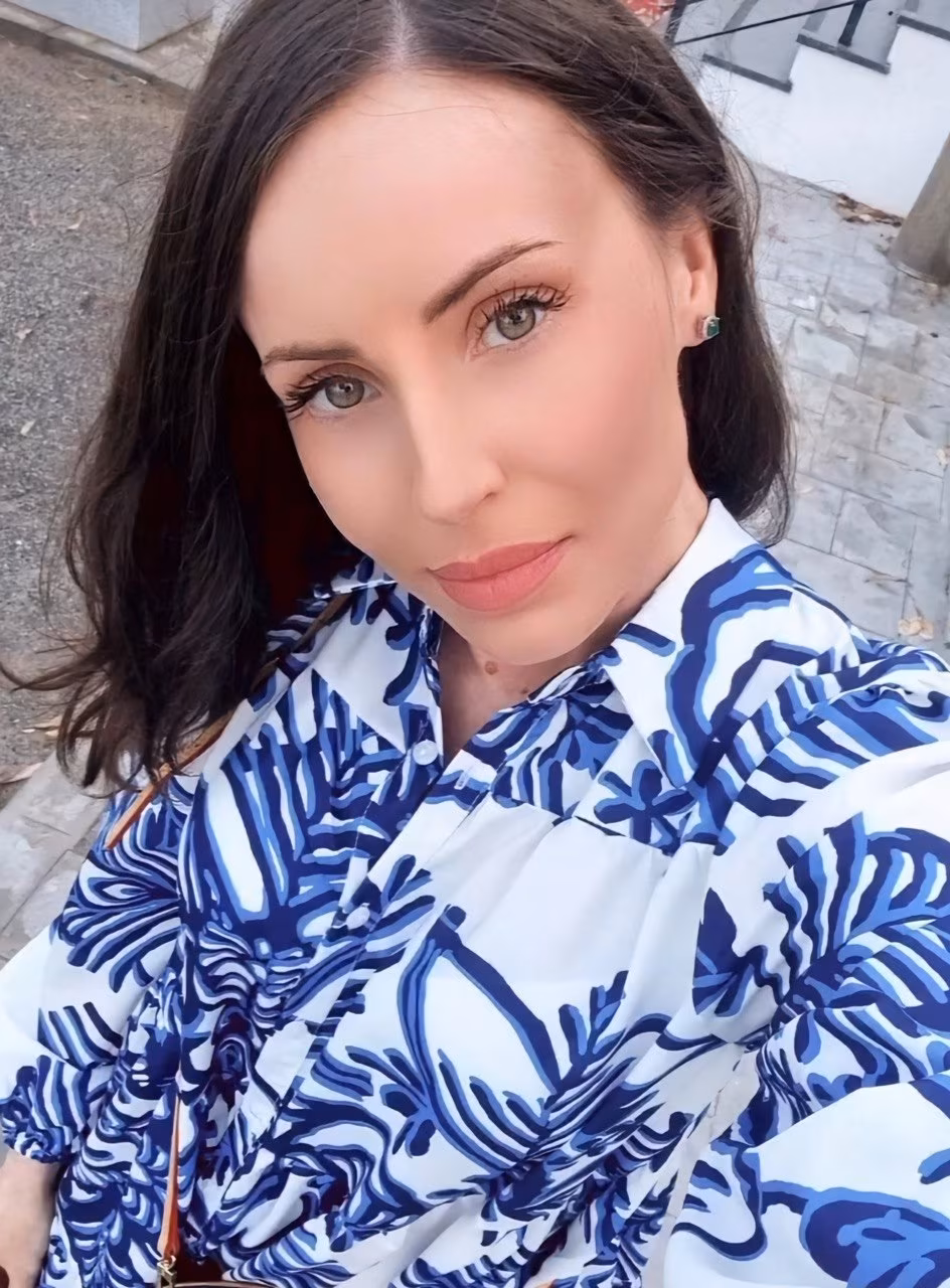 Open Woman's Profile